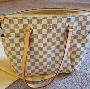 authentic never used Louis Vuitton tote